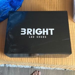 BRIGHT LED high top shoes size 10 (US).